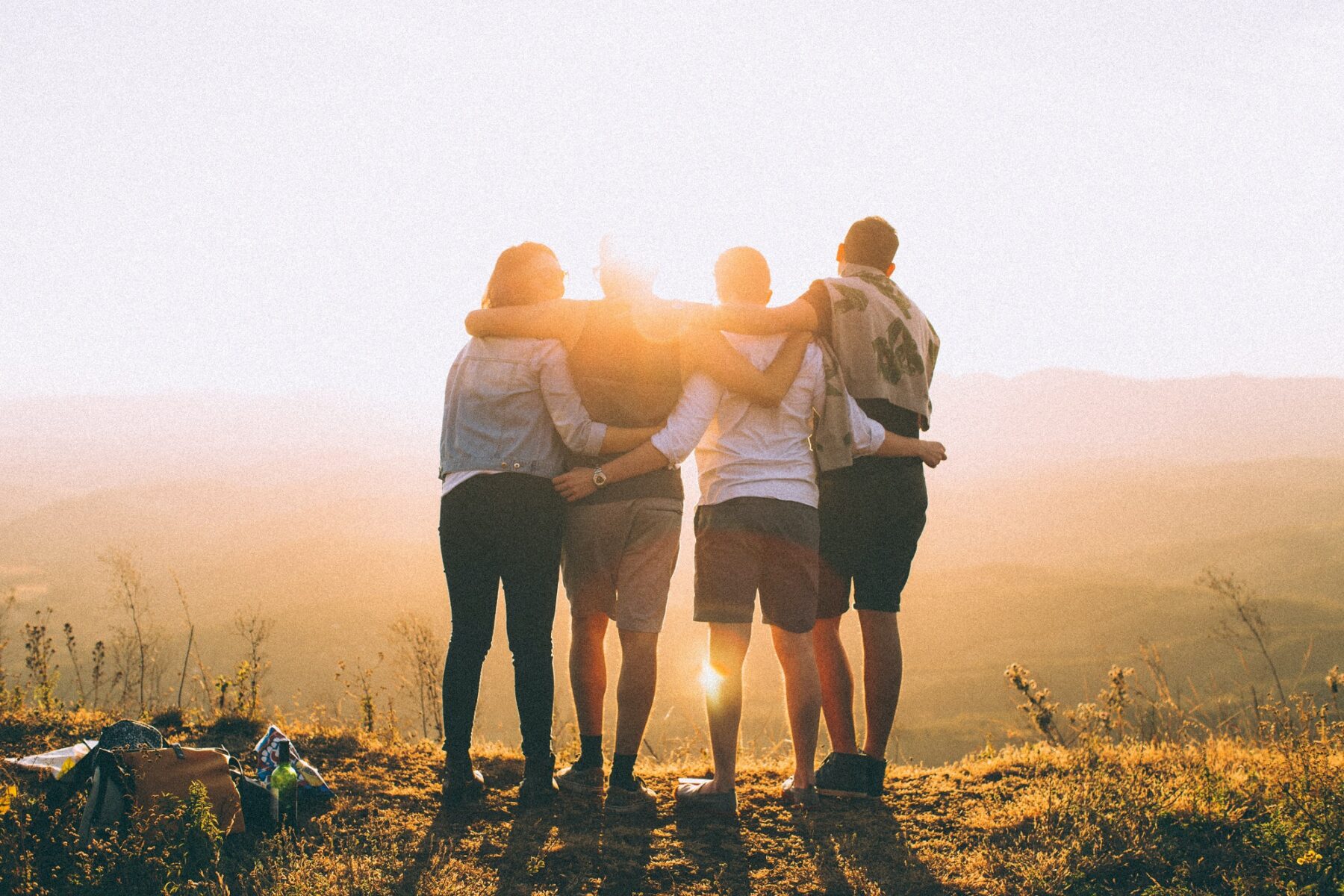 Group of friends watching a sunset